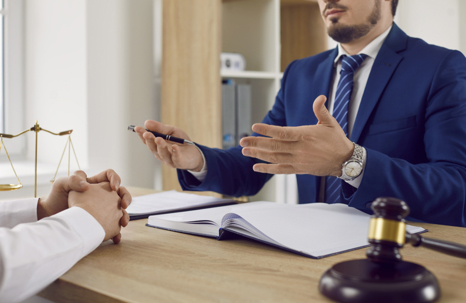 client and lawyer in a serious discussion