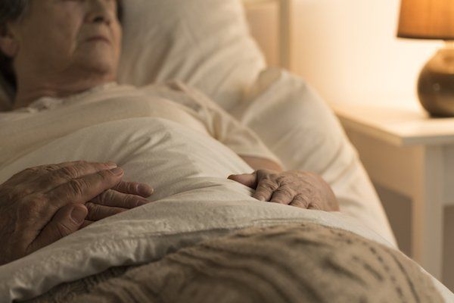 person in bed